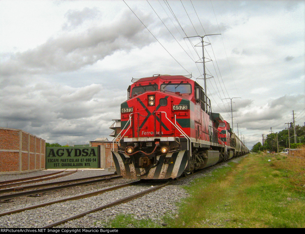 FXE AC4400 Locomotive leading a train